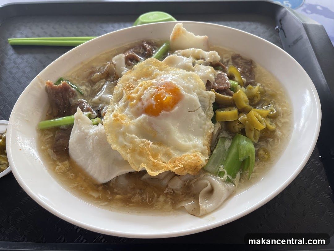 Noodles with Beef and Fried Egg