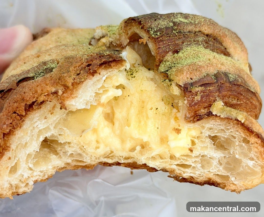 Cream-filled pastry with matcha powder