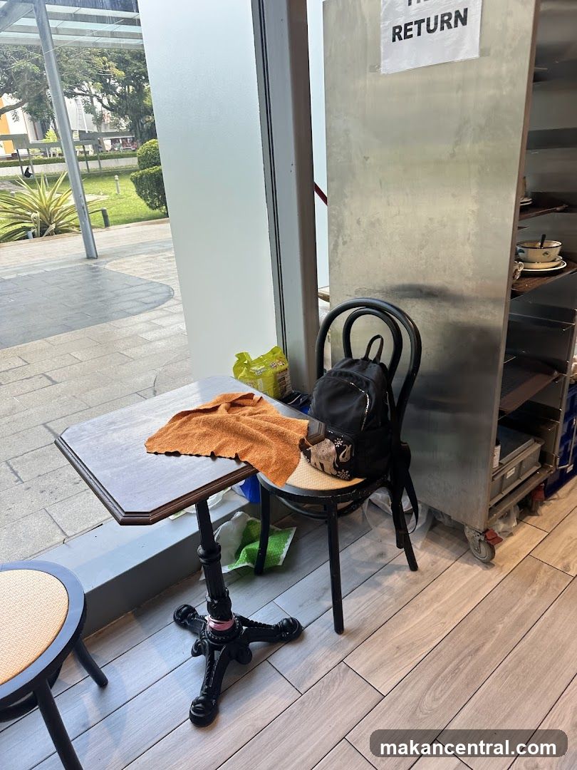 Table and chair with items