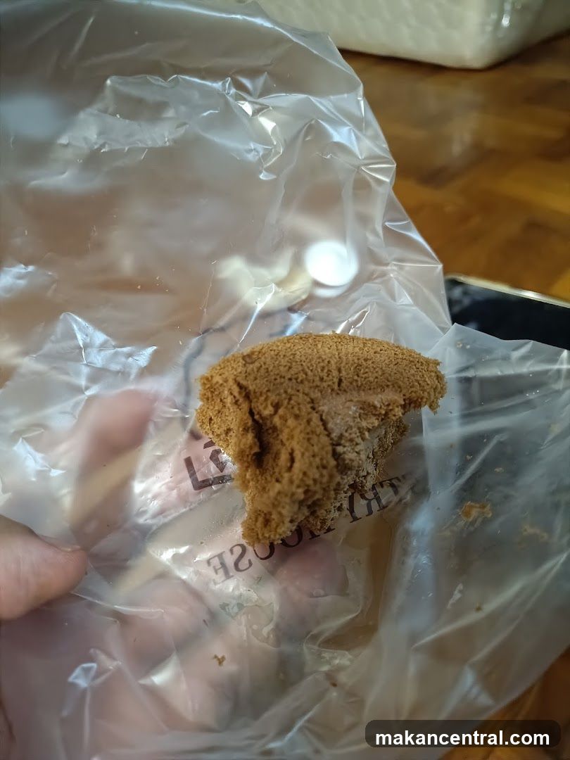 Close-up of a piece of cake in plastic packaging
