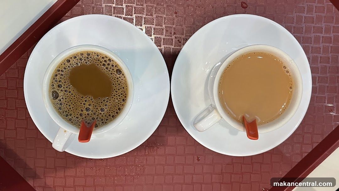 Two cups of coffee on a tray