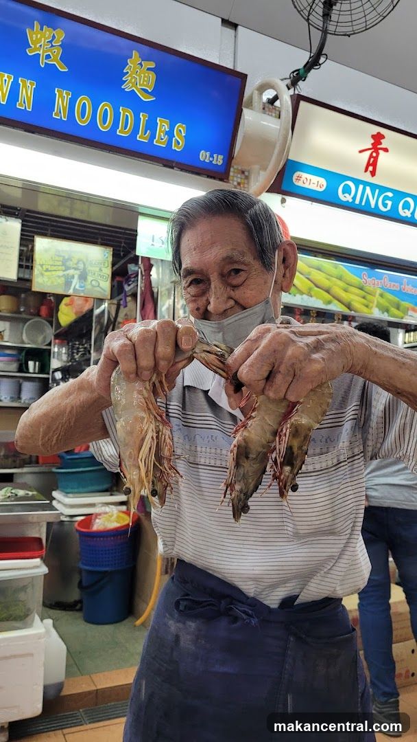 Man holding large prawns
