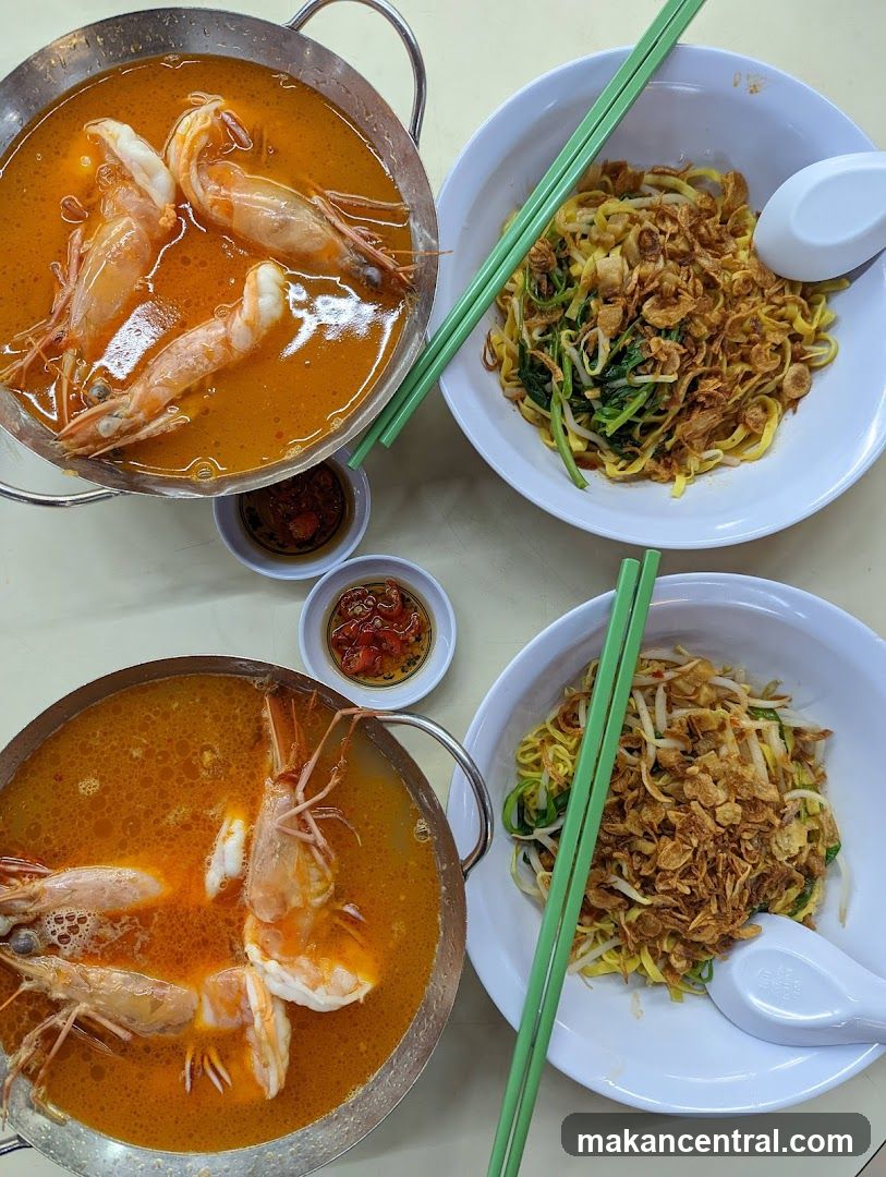 Two bowls of noodles with shrimp soup