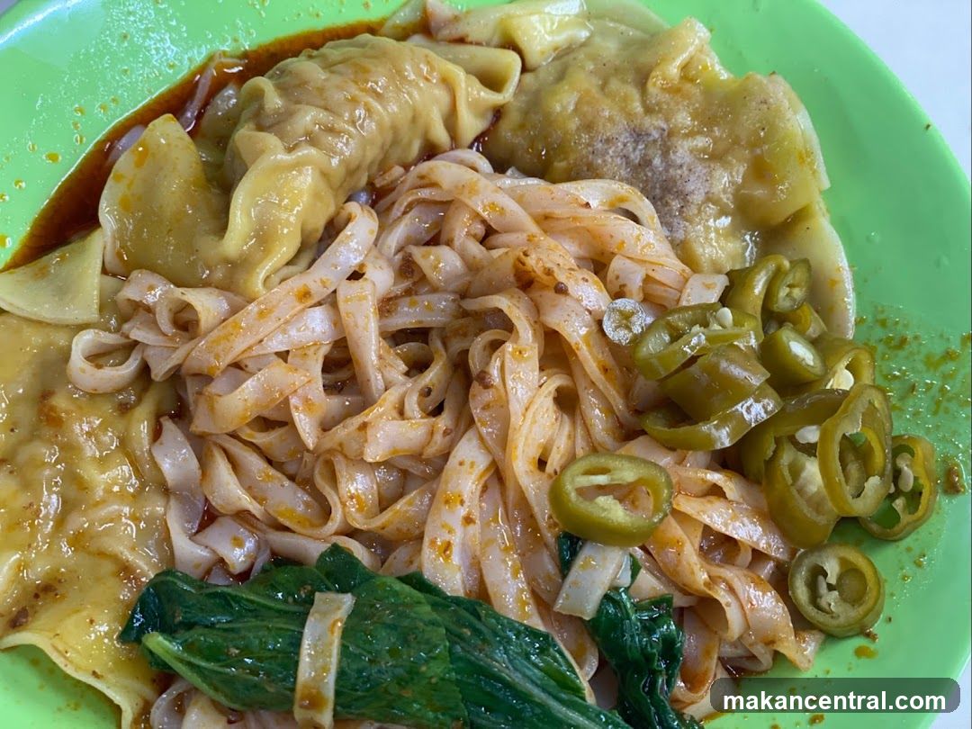 Spicy Noodles with Dumplings