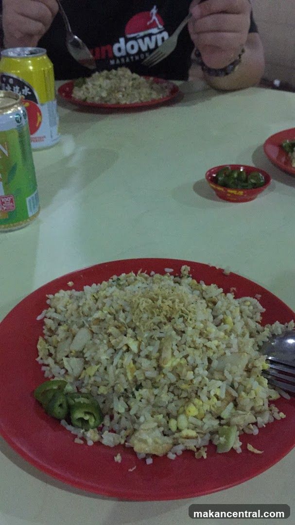 Fried Rice with Chili and Cans of Drink
