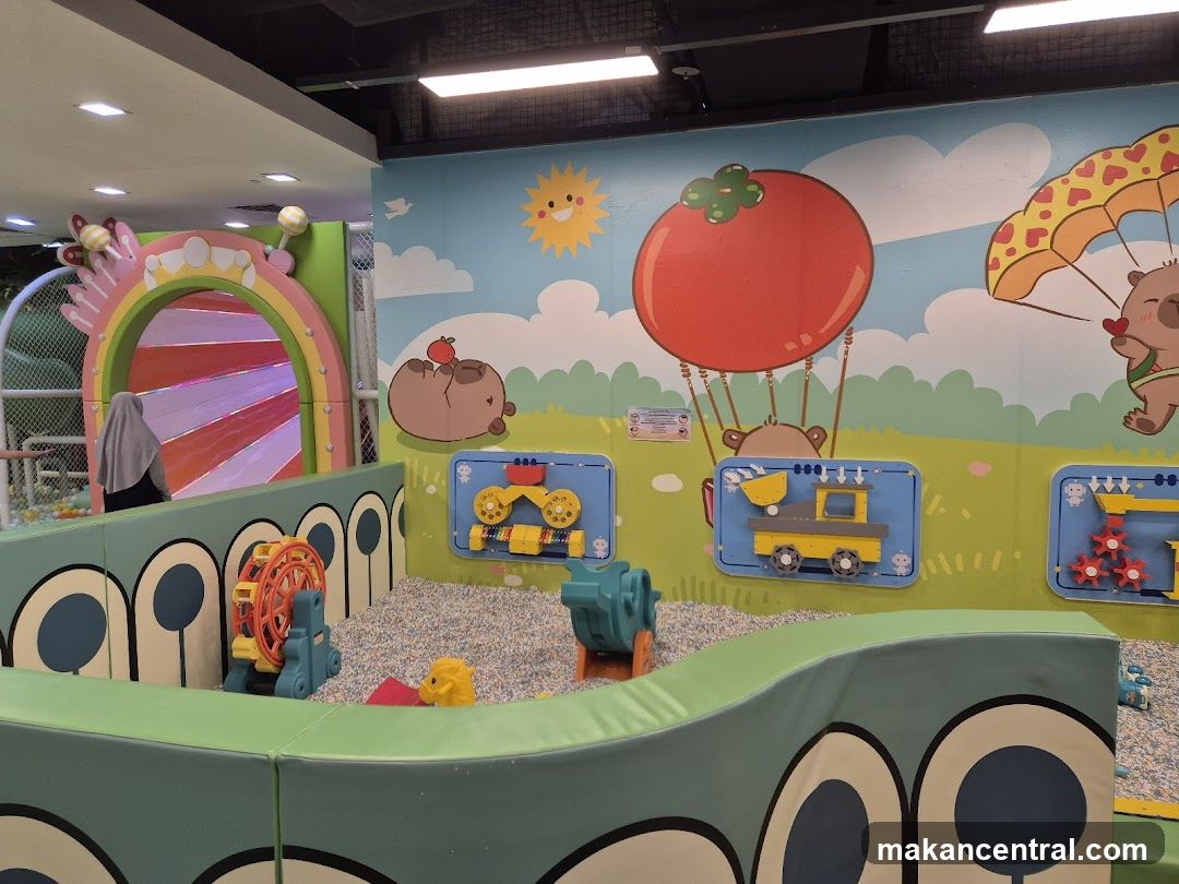Indoor Playground with Cartoon Mural