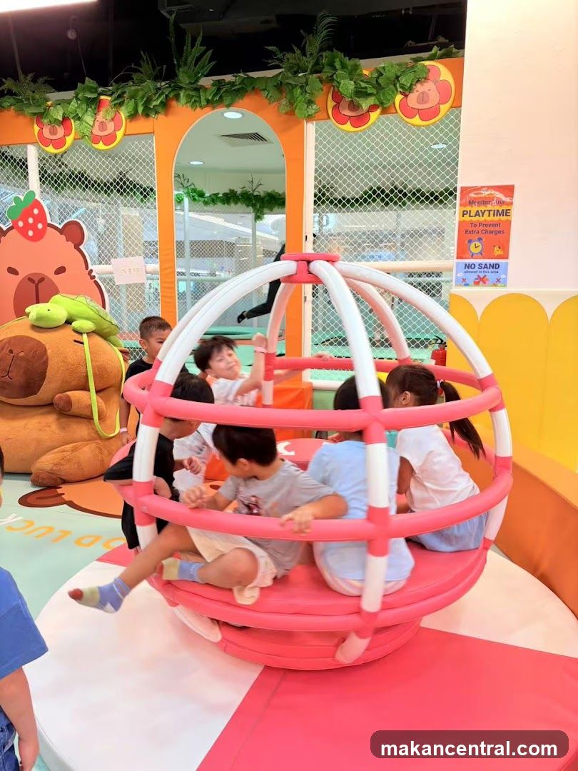 Children playing in a colorful indoor playground