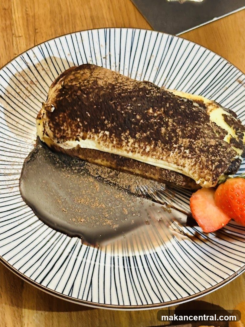 Tiramisu with Chocolate Sauce and Strawberries