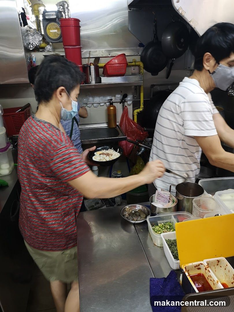 Kitchen Staff Preparing Food