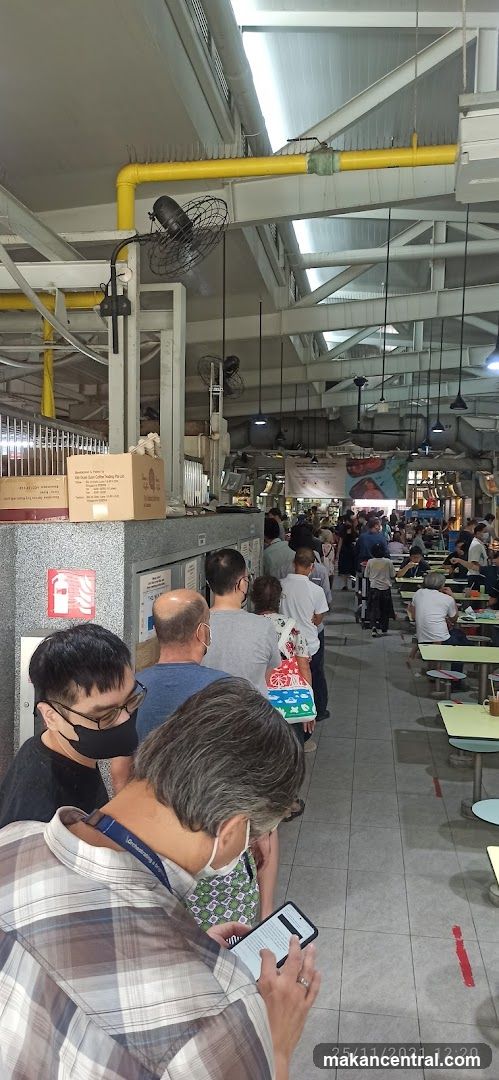 People queuing at a food court