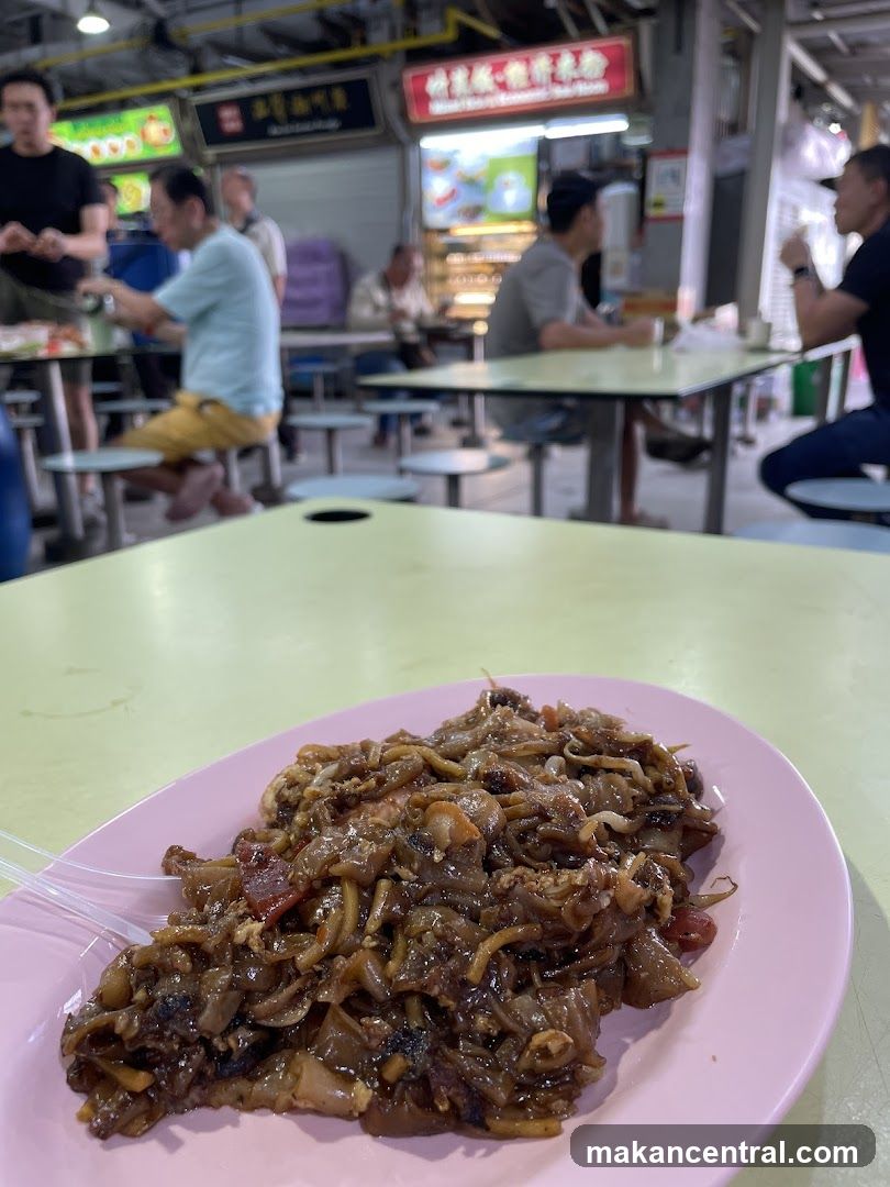 Plate of Noodles at a Food Stall