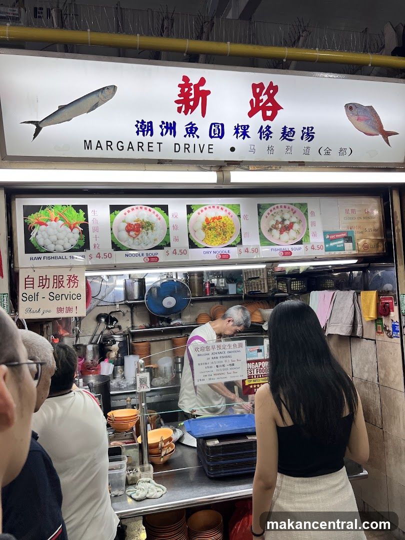 Food Stall with Menu and Staff