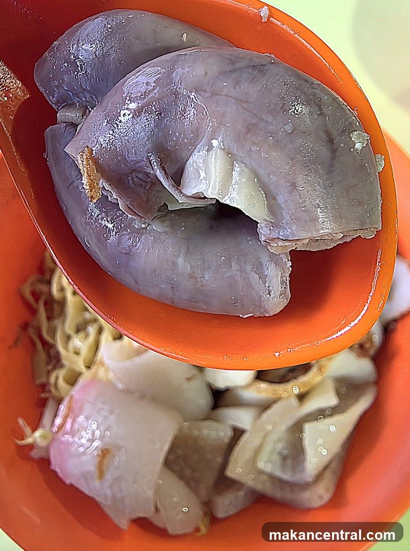 Close-up of Cooked Offal and Noodles