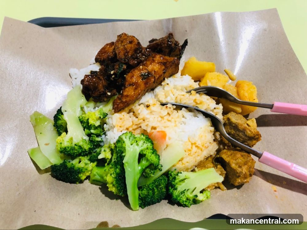 Rice plate with meat and vegetables
