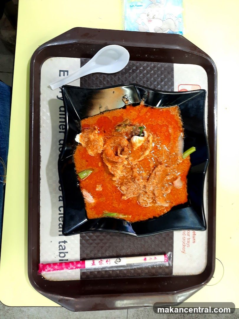 Curry Dish with Spoon and Chopsticks