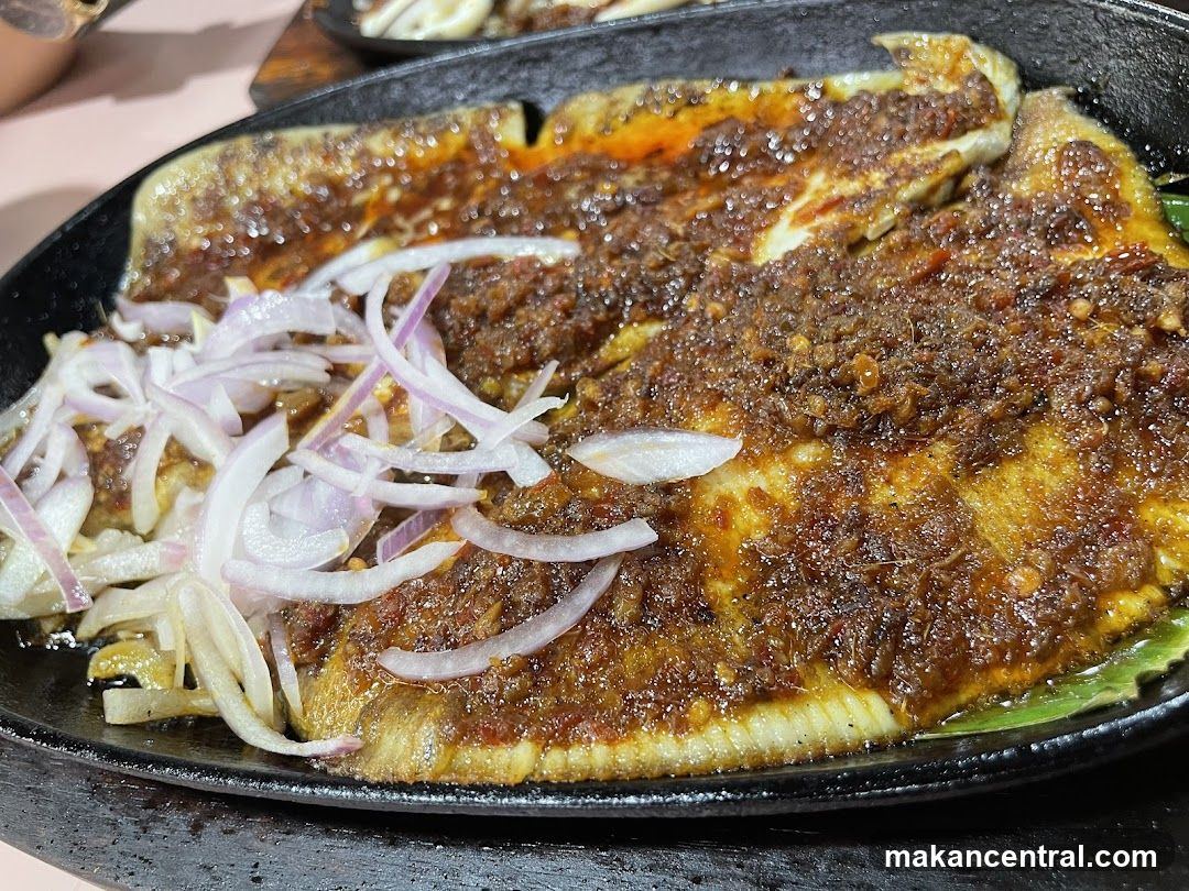 Sizzling Fish with Onions