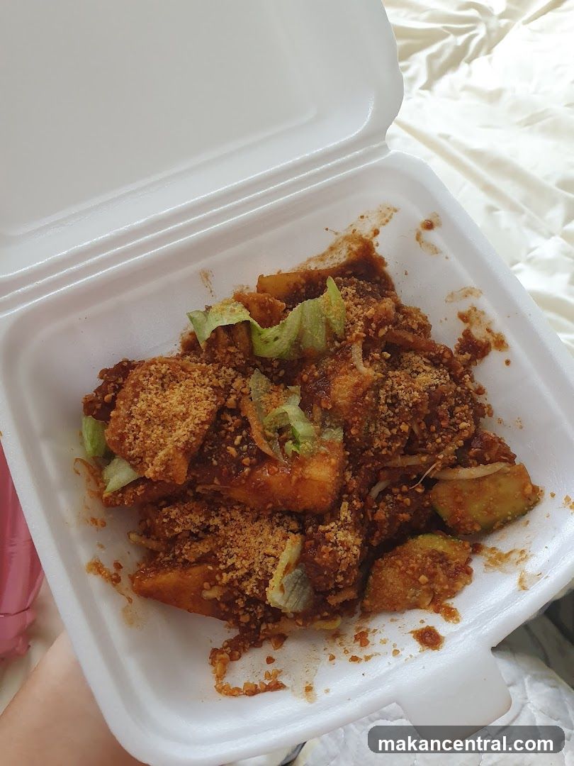 Rojak in a takeaway container