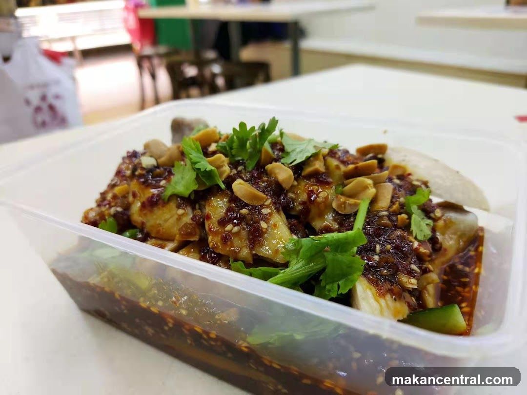 Chicken dish in a takeout container