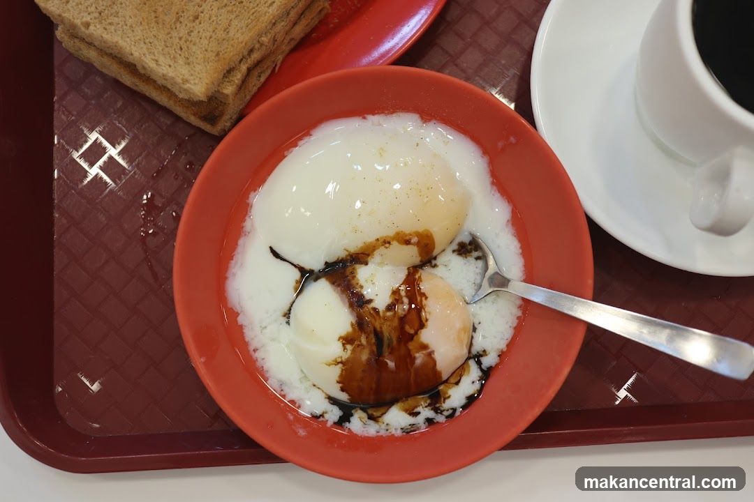 Soft-boiled eggs with toast and coffee