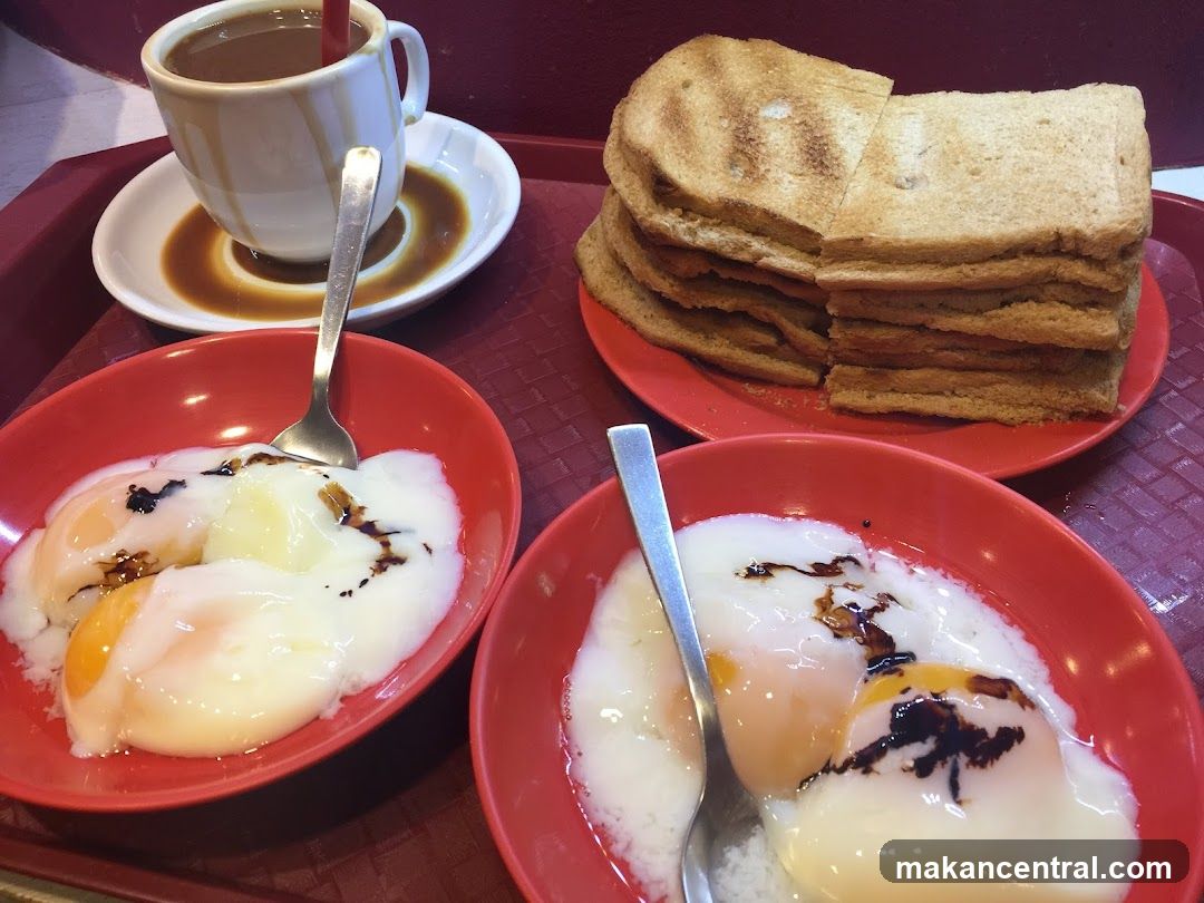 Soft-boiled eggs with toast and coffee