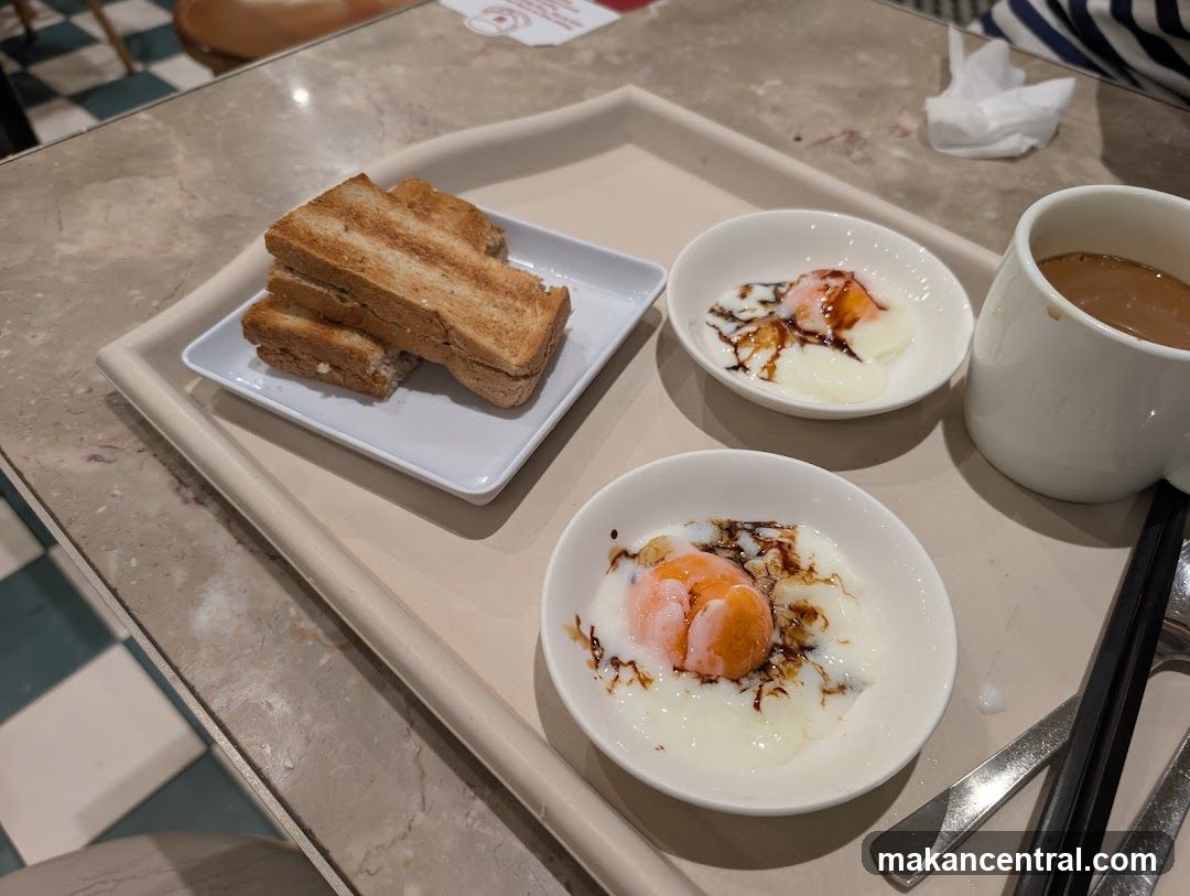 Soft-boiled eggs with toast and coffee