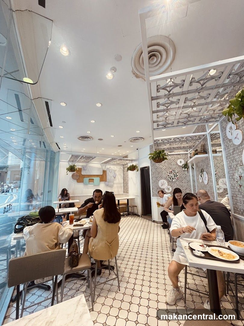 Diners in a bright cafe