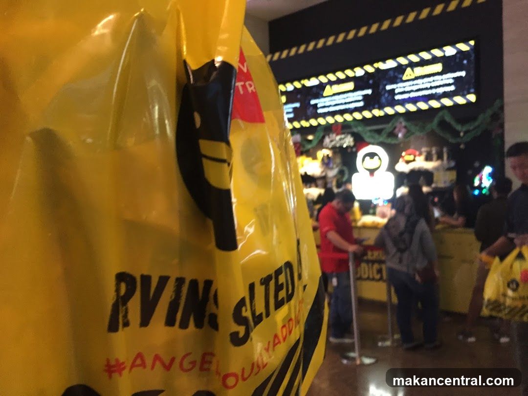 Yellow Bag with Text and Store Interior