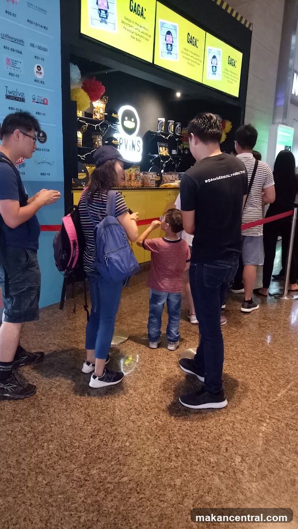 People in line at a food stall
