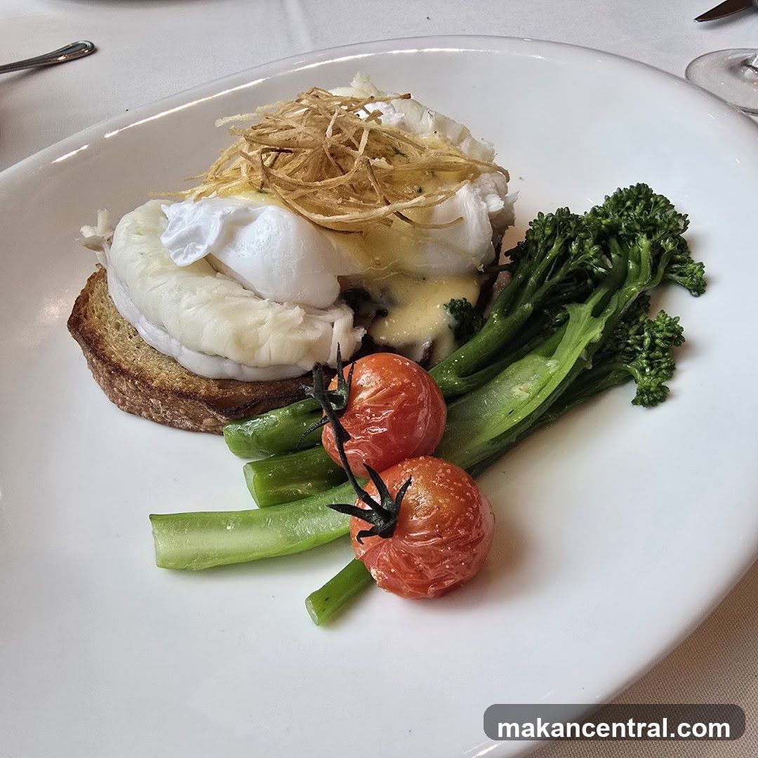 Eggs Benedict with Broccolini and Tomatoes