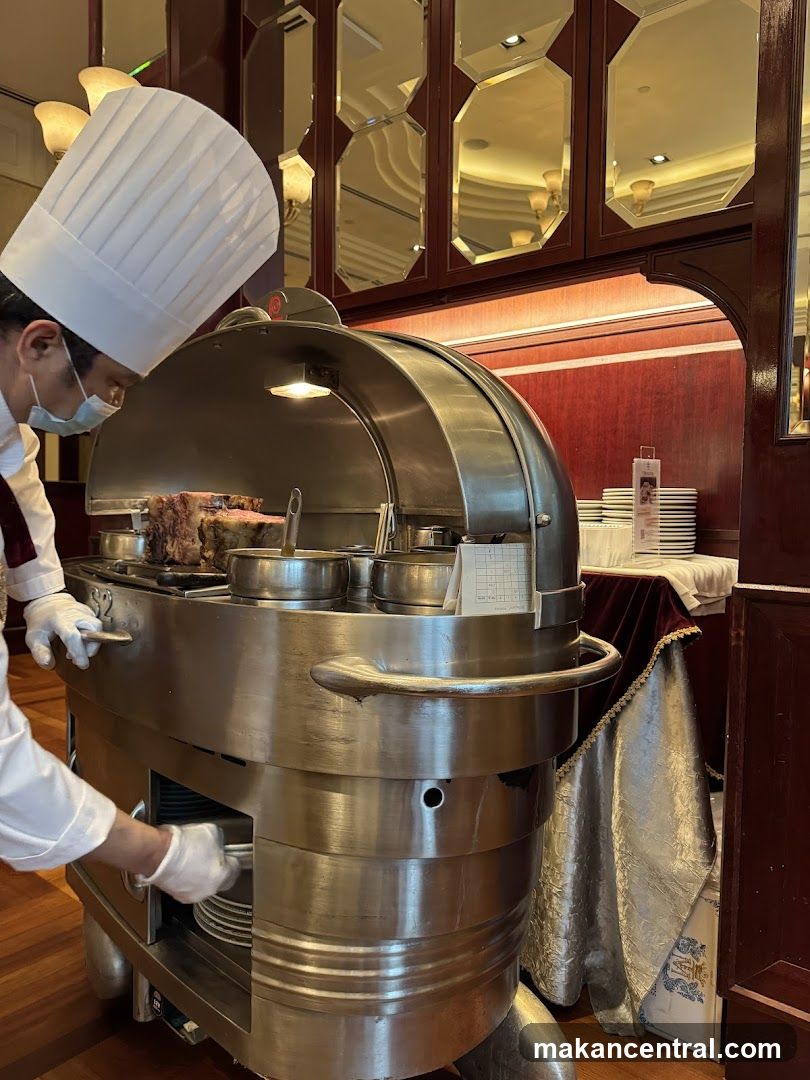 Chef preparing food at a carving station