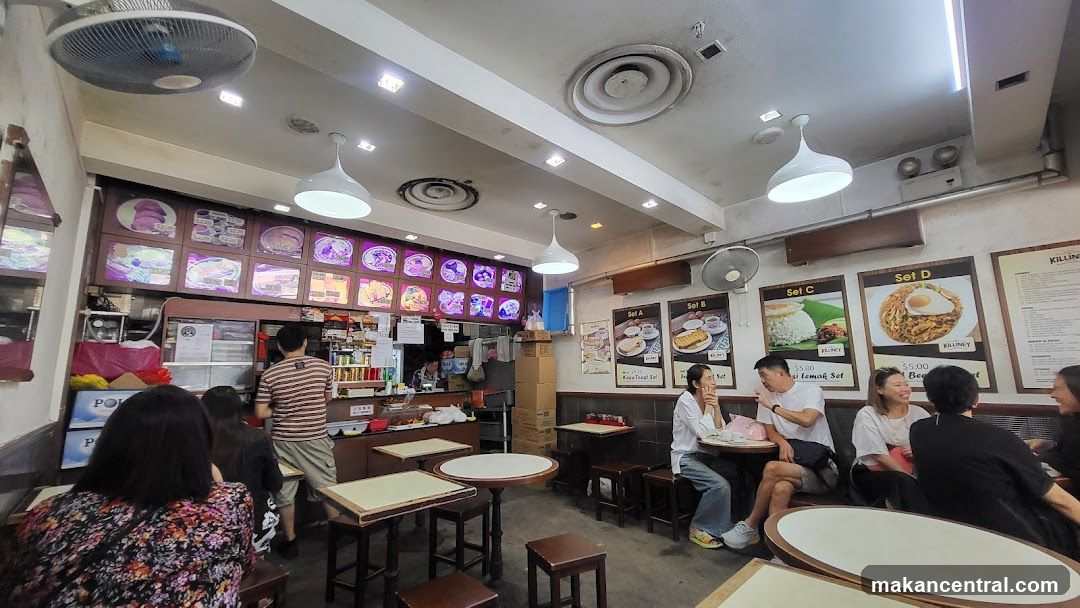 Restaurant Interior with Menu Boards and Diners