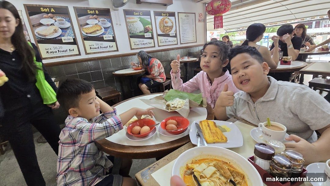 Family enjoying a meal at a cafe