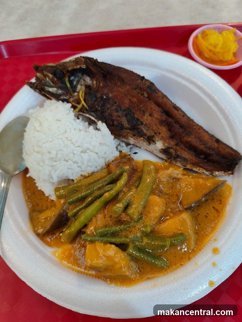 Fried Fish with Rice and Vegetable Stew