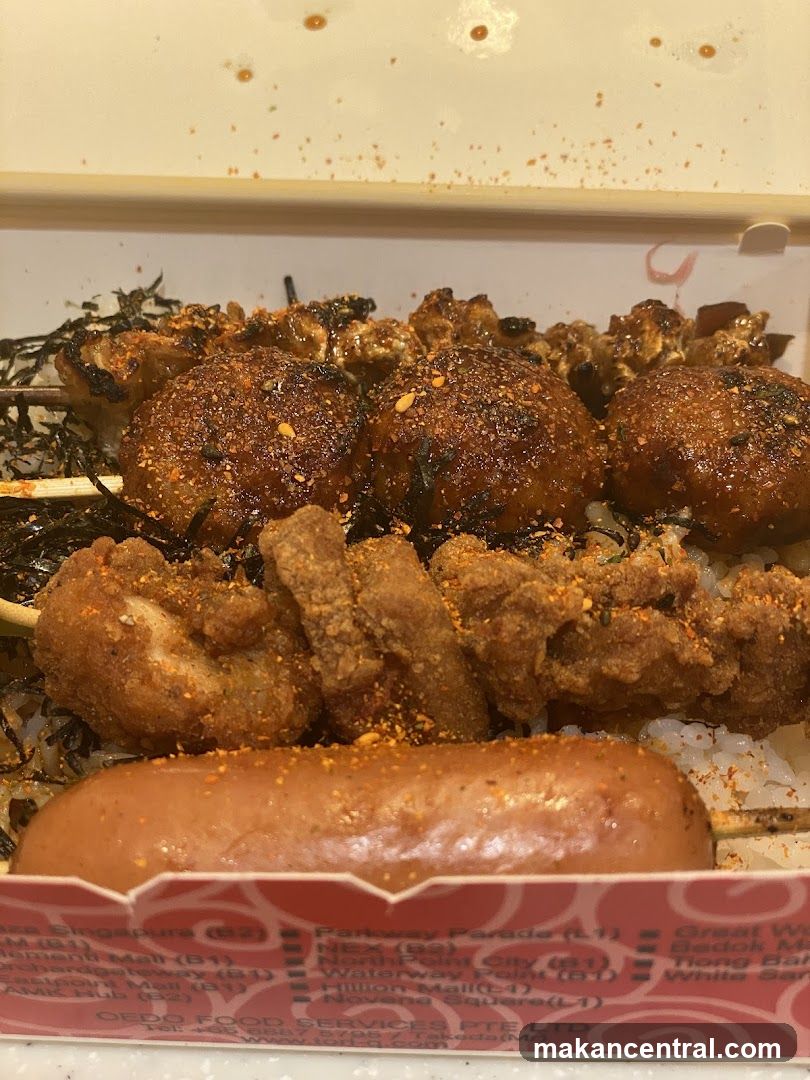 Bento Box with Skewers and Sausage