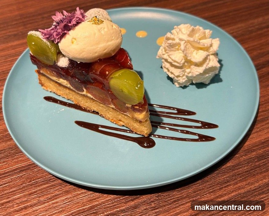 Grape Tart Slice with Whipped Cream