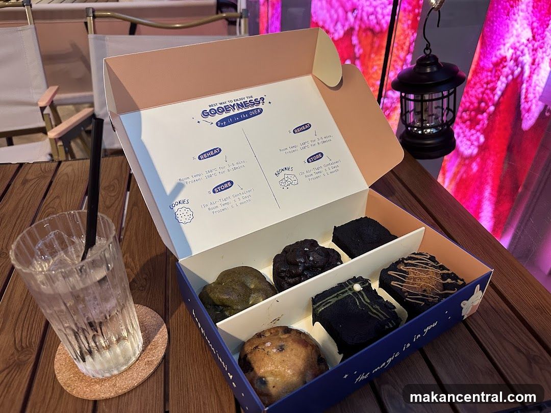 Box of baked goods with a drink