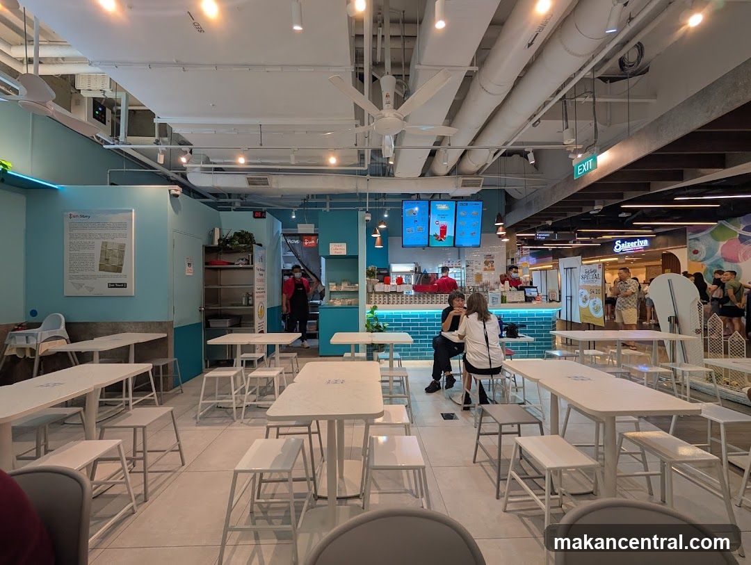 Interior of a bright cafe with seating