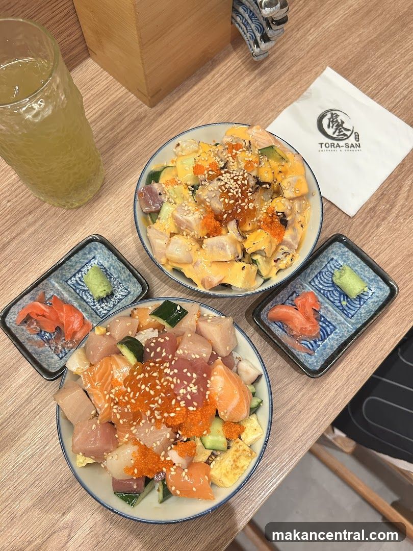 Two bowls of poke with a napkin