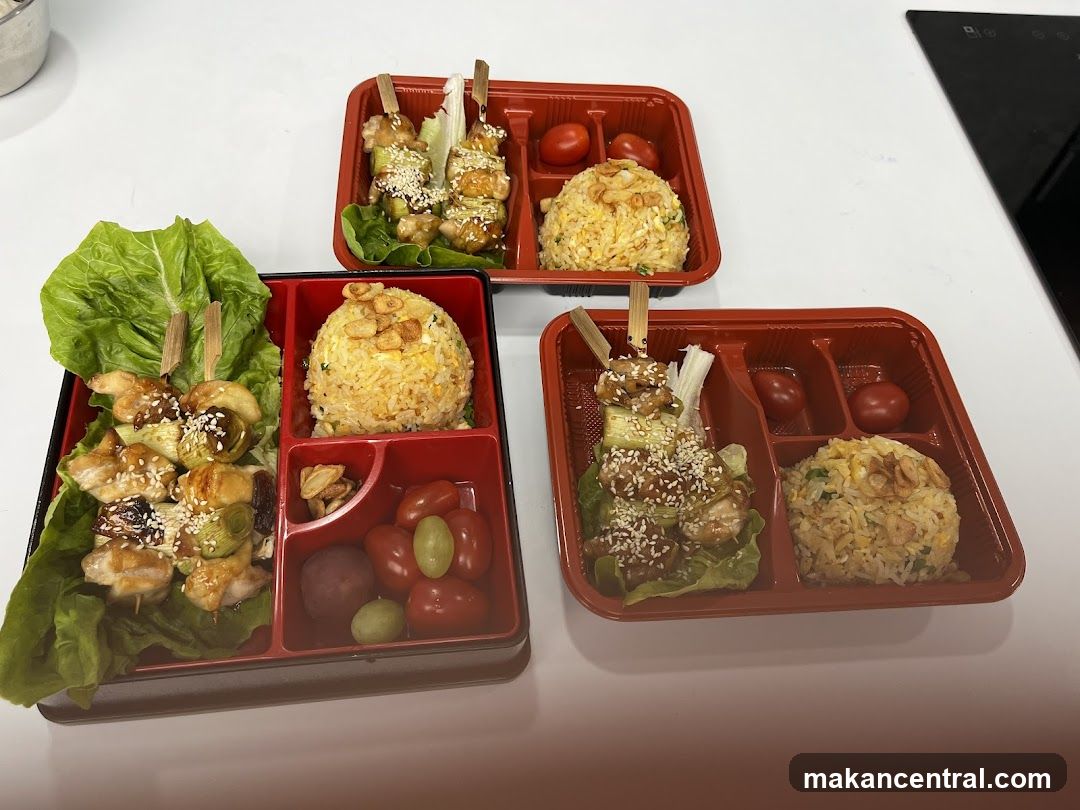 Bento Boxes with Skewers and Fried Rice