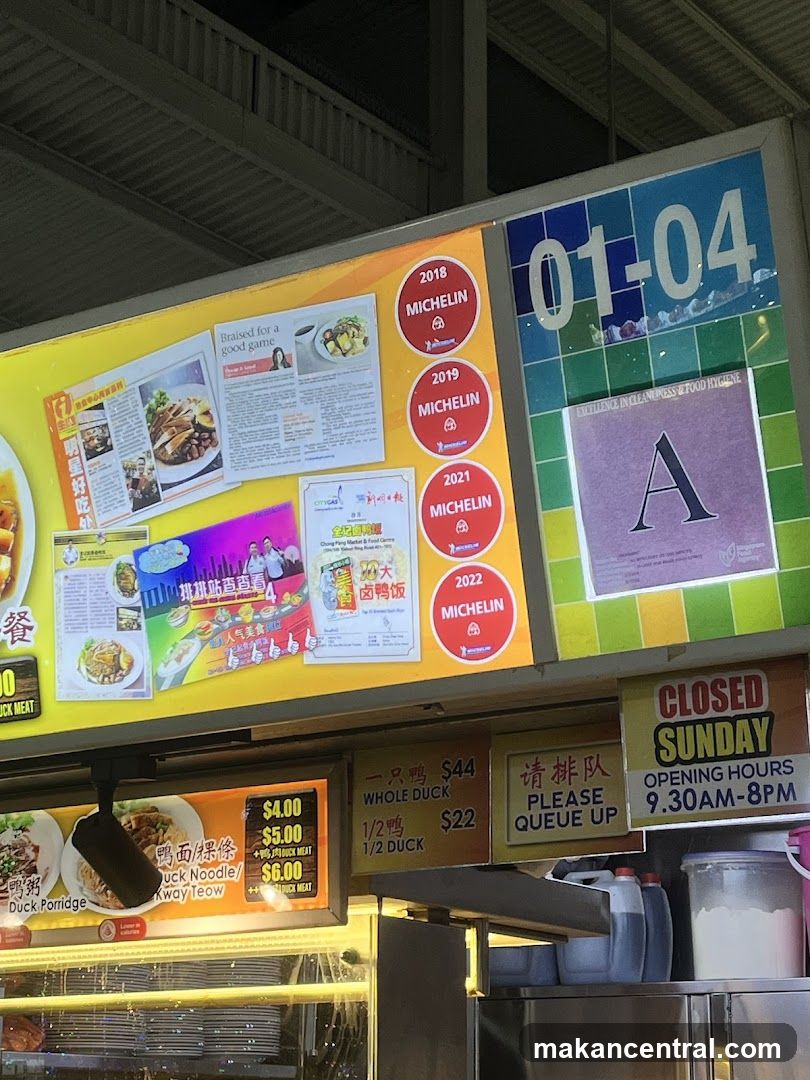 Food stall with Michelin awards and menu