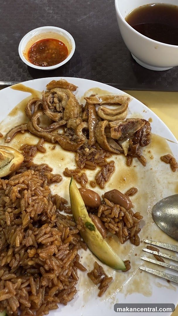 Plate of food with rice and meat