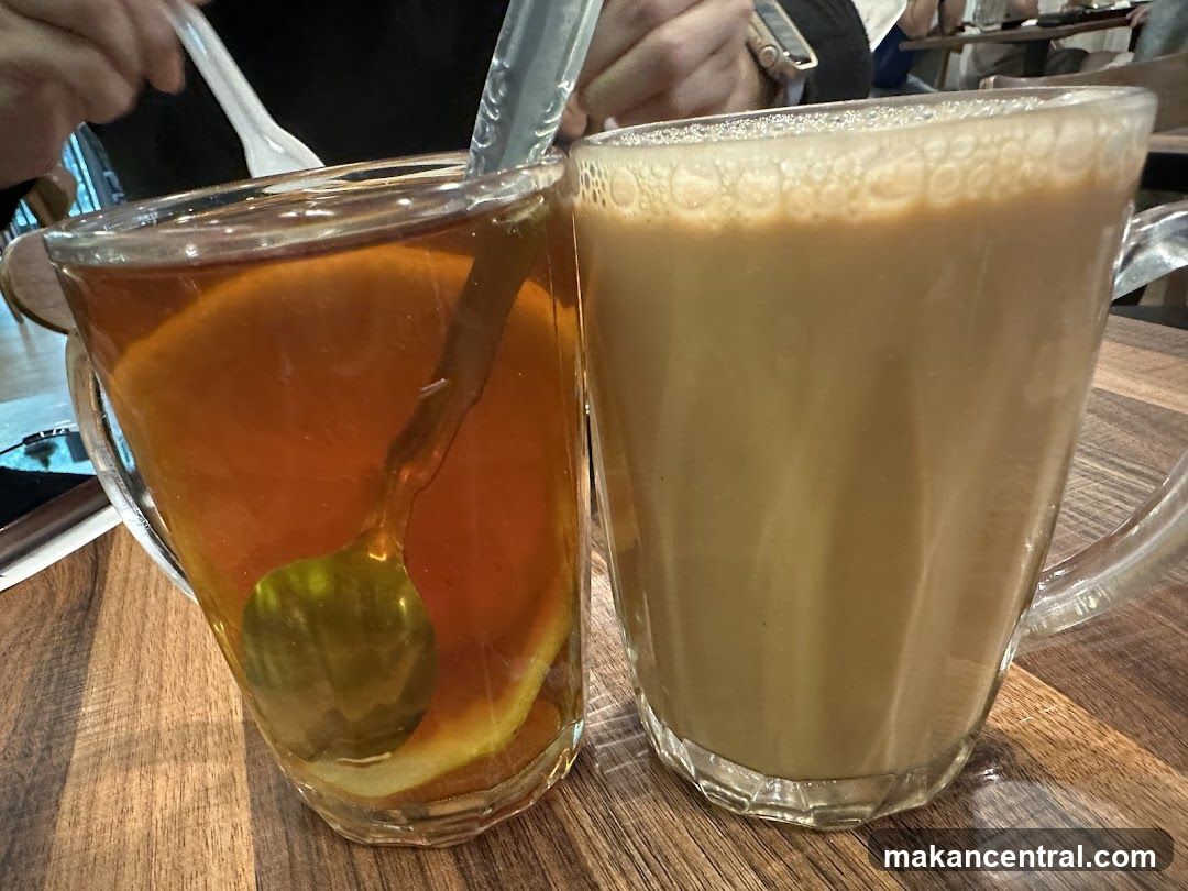 Two drinks on a wooden table