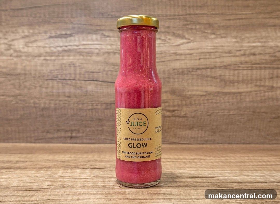 Bottle of Glow Cold Pressed Juice