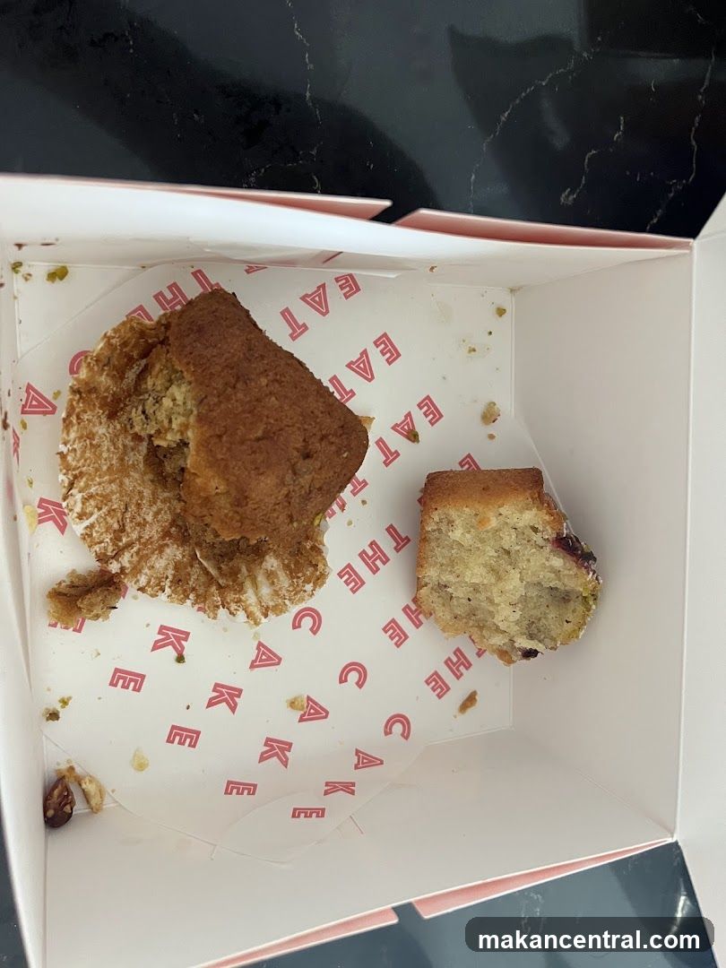 Half-eaten cake in a box