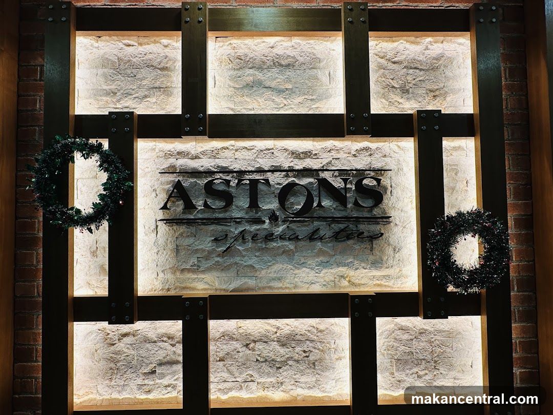 Aston's Specialities Sign