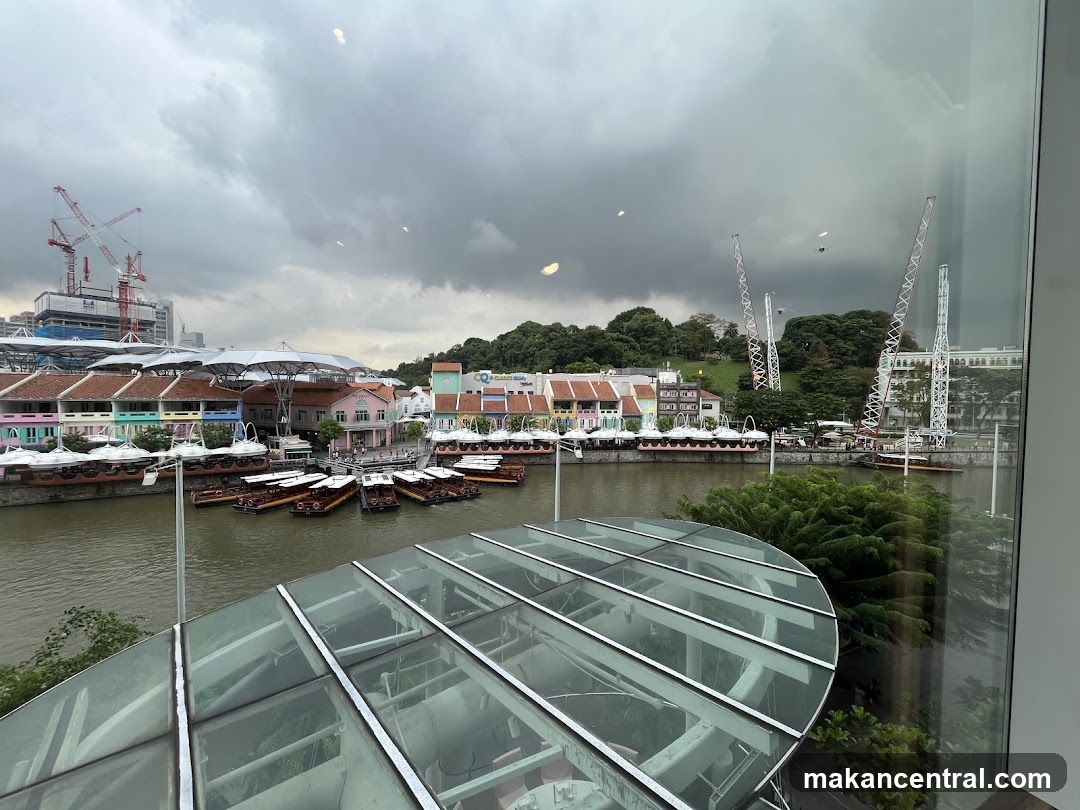 Riverfront with colorful buildings and boats