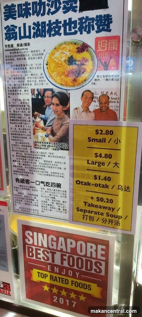 Newspaper clipping and menu board
