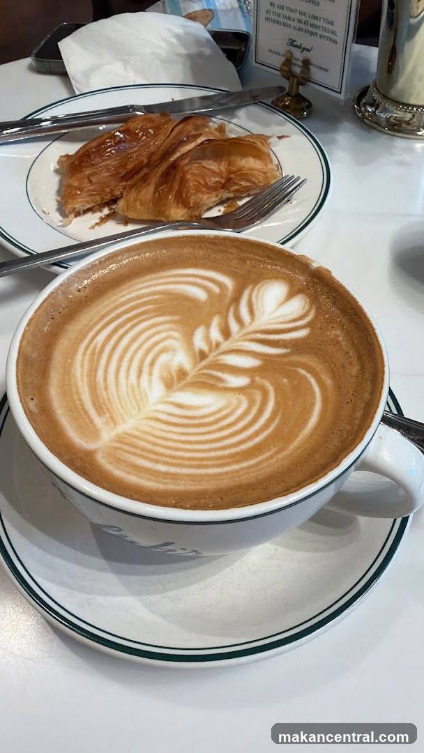 Latte Art and Croissant