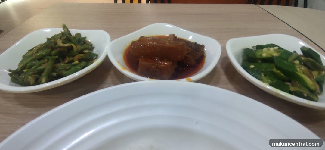 Three dishes of food on a table