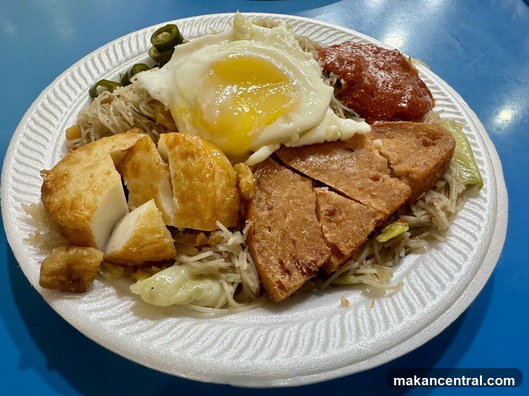 Fried Fish Cake and Luncheon Meat with Noodles